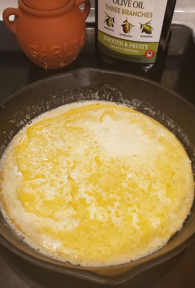 creamy garlic sauce in a cast iron skillet