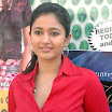 Poonam Bajwa looking sexy in red shirt