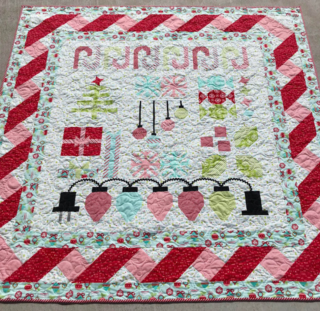 A Scrappy Happy Holidays Flannel Quilt Designed, Pieced & Quilted by Thistle Thicket Studio. www.thistlethicketstudio.com