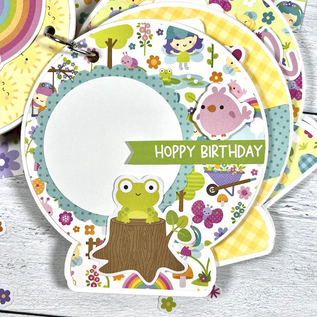 Fairy snow globe shaped scrapbook album page with frog