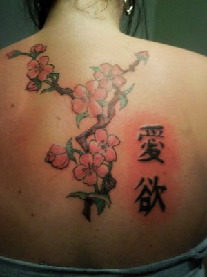 Upper Back Tattoo Ideas With Cherry Blossom Tattoo Designs With Picture