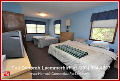 All the bedrooms in this gorgeous home for sale in Candlewood Lake provide the comfort and relaxation you are sure to take delight in.