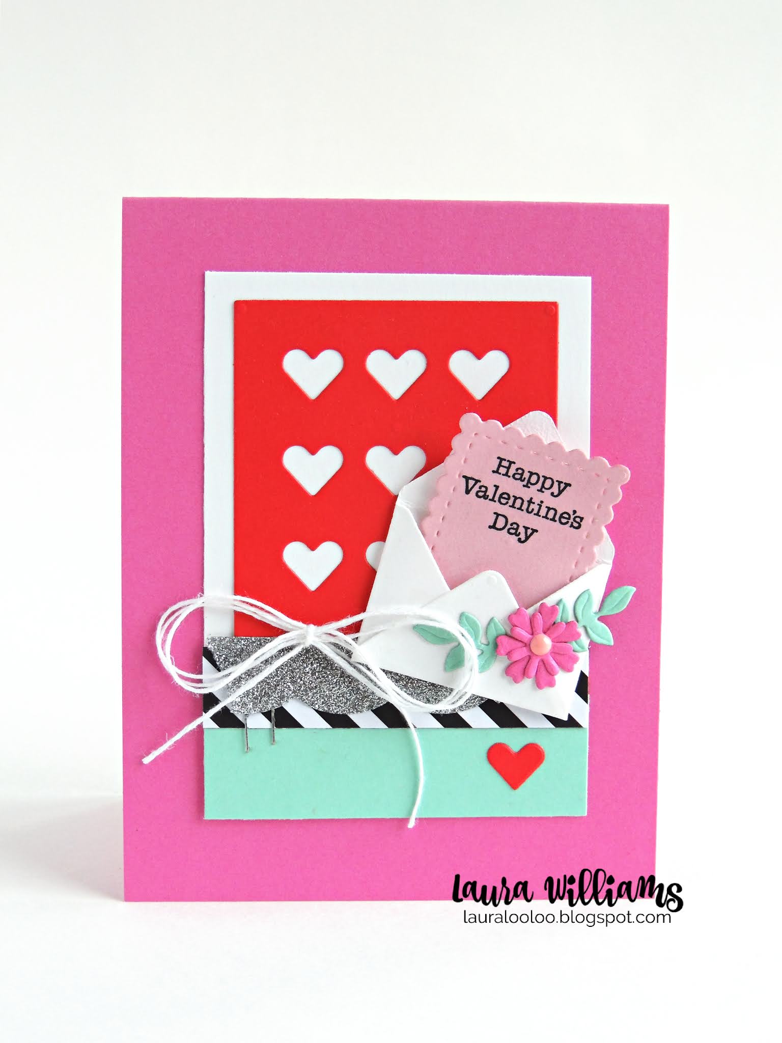 Handmade valentine card with a baby envelope and hearts background that says Happy Valentine's Day, with pink flowers and a white bow.