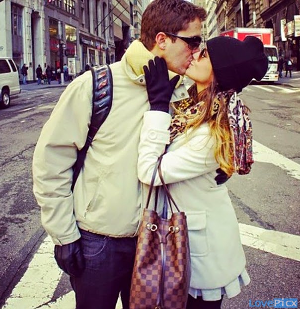 Boy Girl Couple Kissing On Road Mid Street