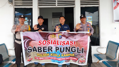 Berantas Pungli! Polsek Kualan Kampar Melaksanakan Sosialisasi ke Masyarakat