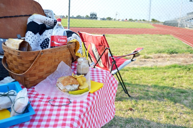 Tailgate picnic basket sandwich coke float at football field