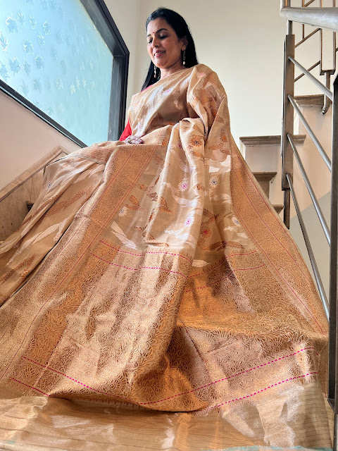 Gold banarasi katan silk saree with a kaduwa weave