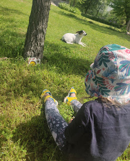 Rosie looking at her fairy house