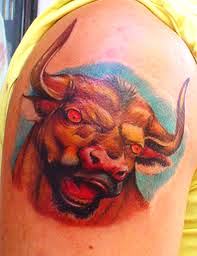 http://allaboutbodyart.blogspot.com/ bull_tattoo_arm_tattoo_design