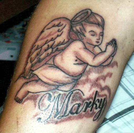The tattoo can portray a happy peaceful angel or a protective guardian 