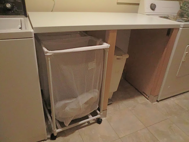 Laundry folding station out of a dishwasher cabinet