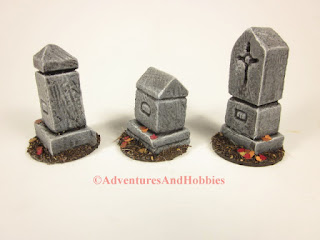 Left side view of three graveyard monuments for 25 to 28mm scale wargames.