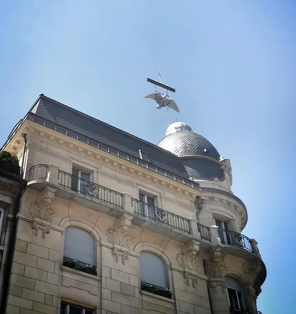 The restored eagle placed on top of the historic Eberhard building