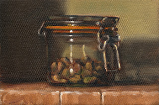 Oil painting of a small preserving jar half filled with shelled pistachios.