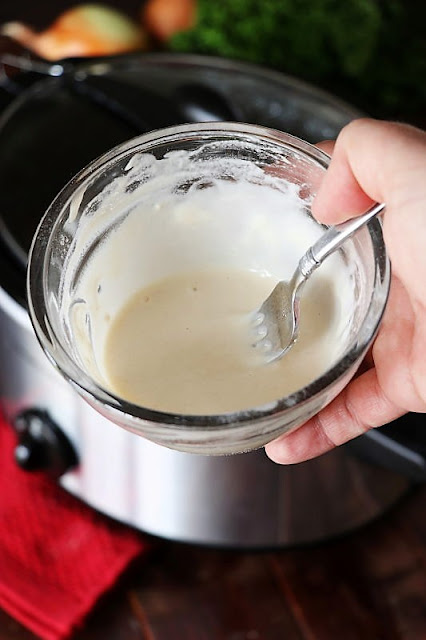  Slices of boneless overstep circular steak laid upwards up fork Creamy Crock Pot Round Steak