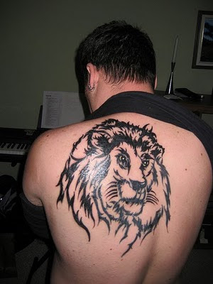 Lion head tattoo on shoulder. Lion Tattoo Design on Sexy Girl Arm Sleeves.