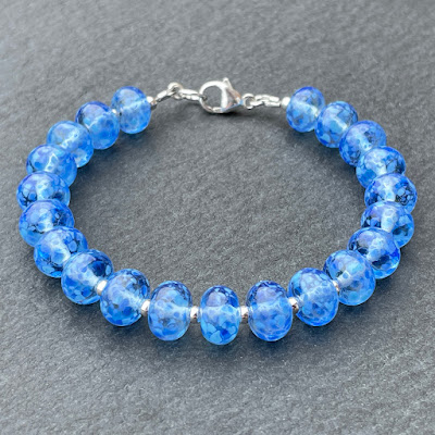 Handmade lampwork bead bracelet in shades of blue