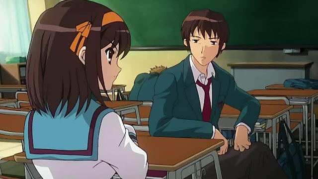 Kyon en conversacion con Haruhi.