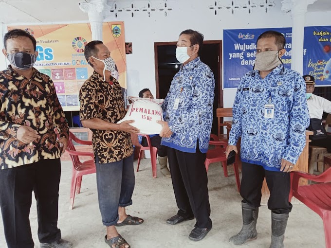 Penyaluran Bantuan Beras Dispertan Ke Beberapa Desa Yang Mengalami Musibah Banjir