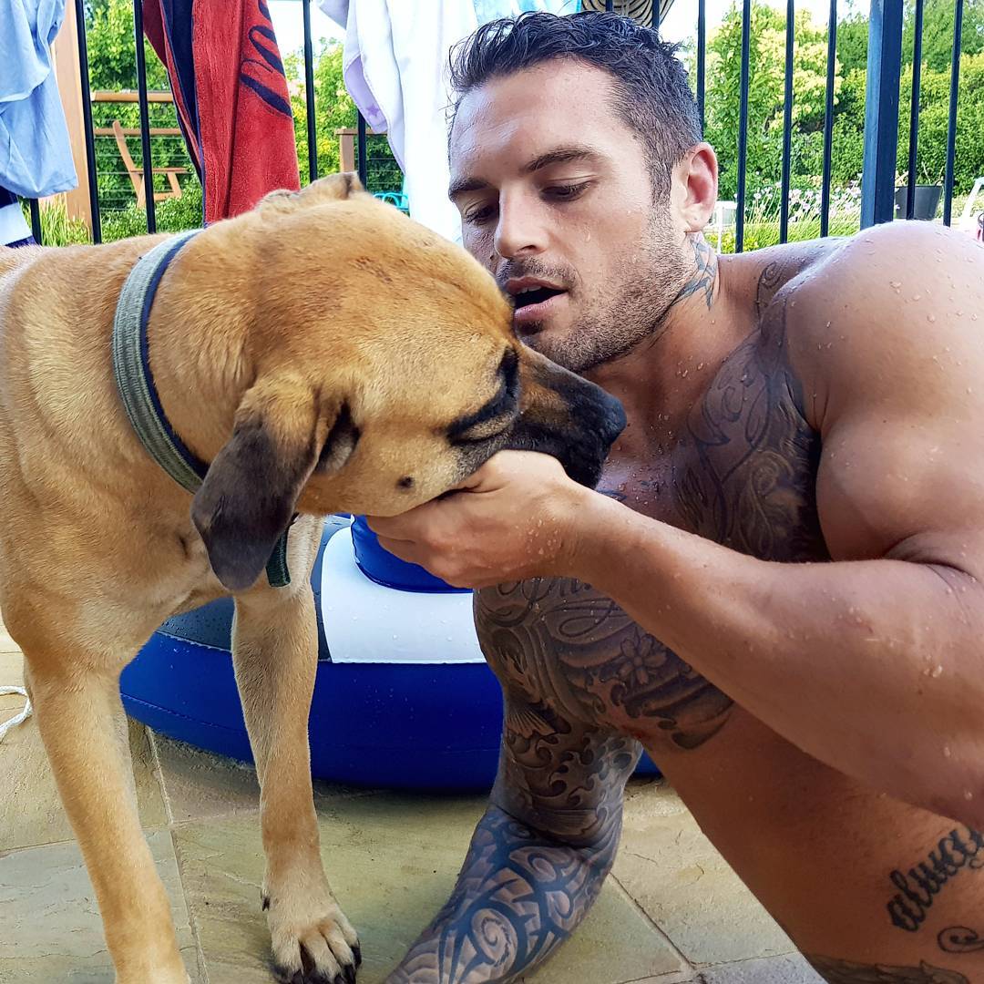 hot-manly-man-tattoo-daddy-dog-kiss