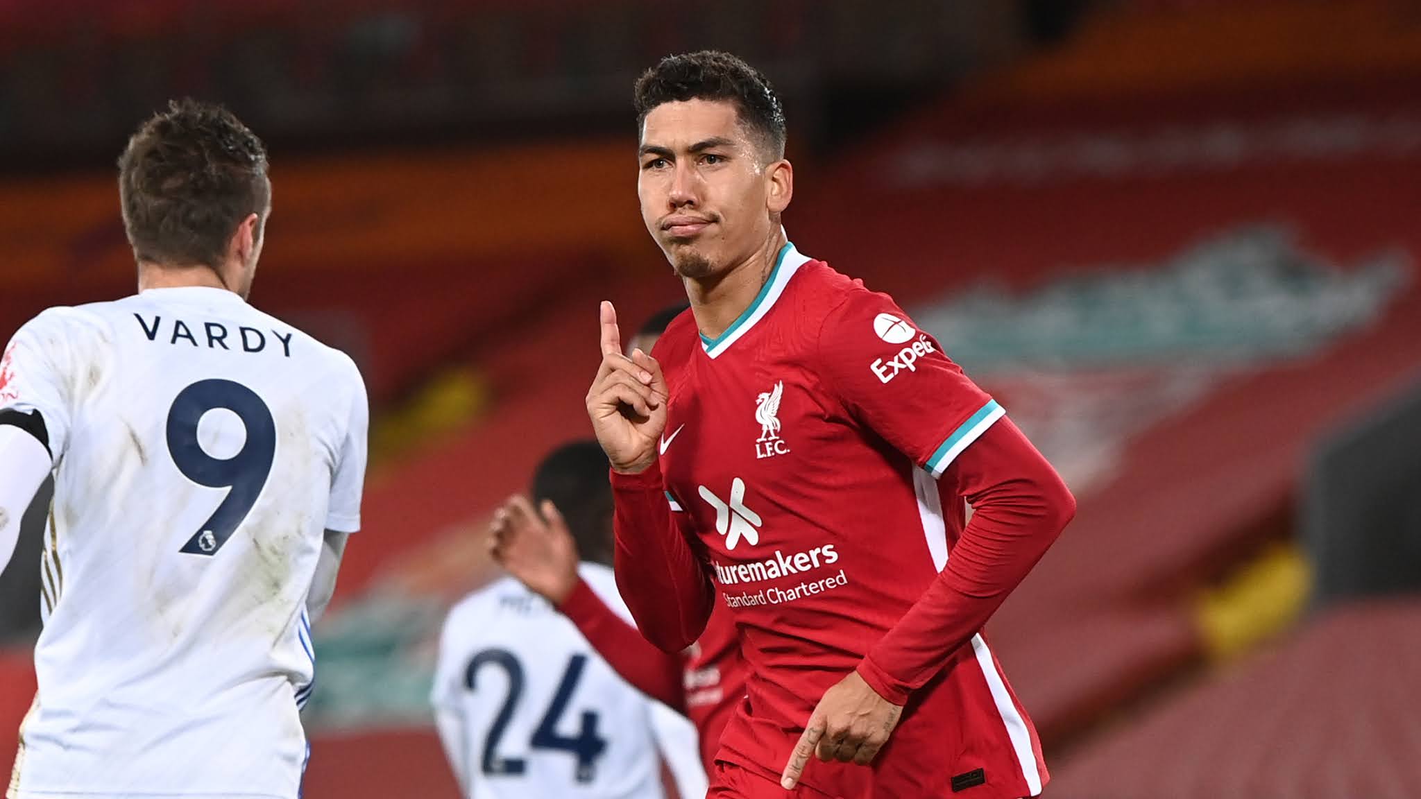 Roberto Firmino scores an header against Leicester City at Anfield