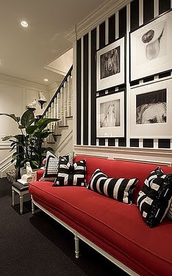 red sofa black and white pillows