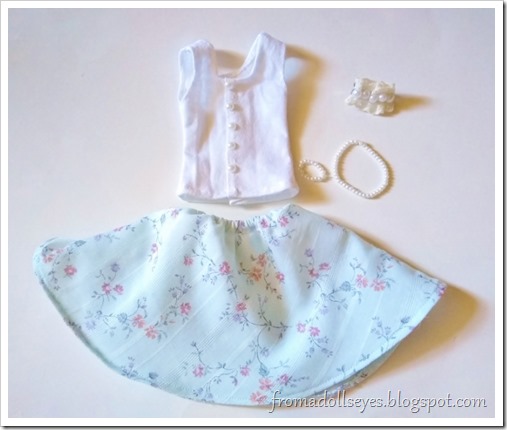 A cute outfit for  a ball jointed doll.  A white tank top with 