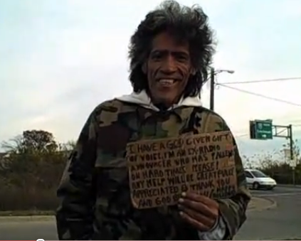 funny homeless signs. with a sign that says,