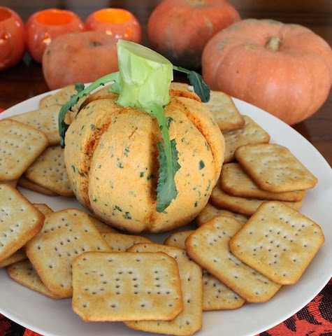 Food Lust People Love: This pumpkin-shaped spicy cheese ball is a great addition to any Halloween or Thanksgiving party table.