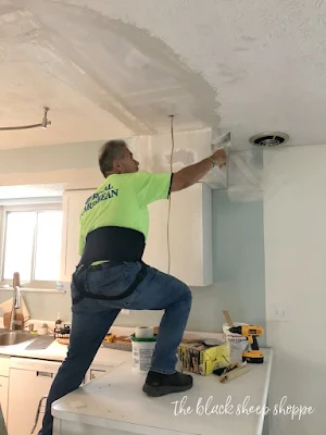 Patching holes in drywall.