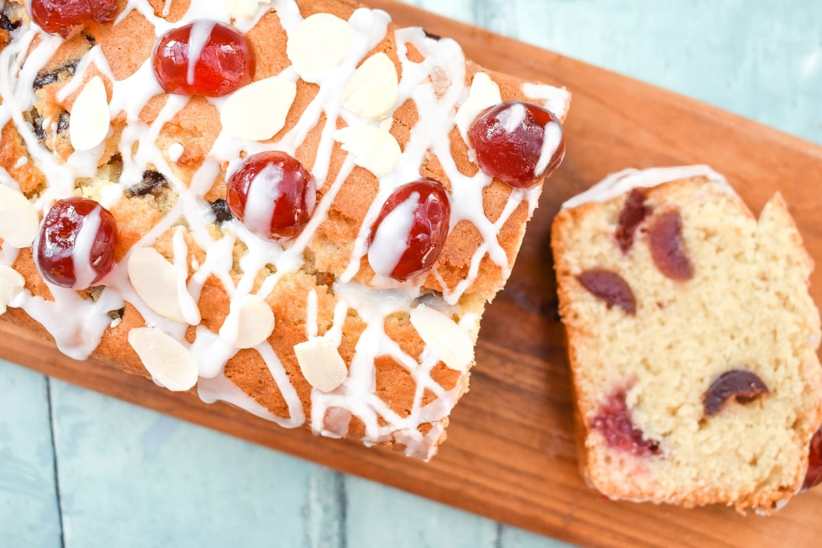 cherry bakewell cake on a wooden board