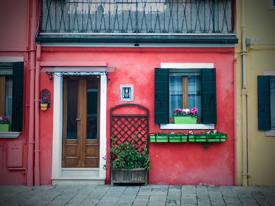 Bright Pink house on the lagoon island of Burano, italy