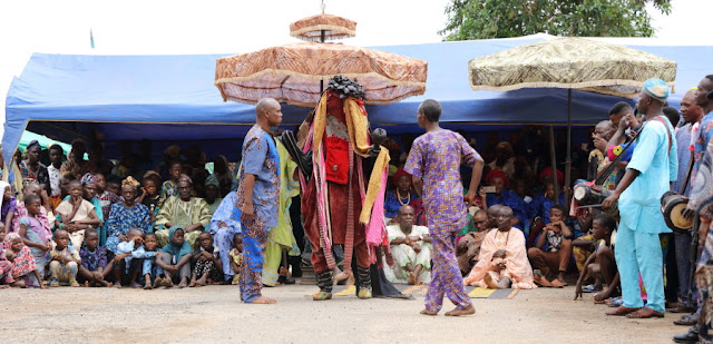 an Egungun paying his homage dance to the Oba of Osogbo