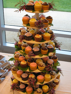 The bride wanted a fun colorful mix of cupcakes and 