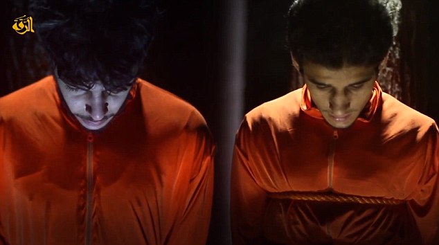 ISIS release video of 2 activists executed tied to a tree!