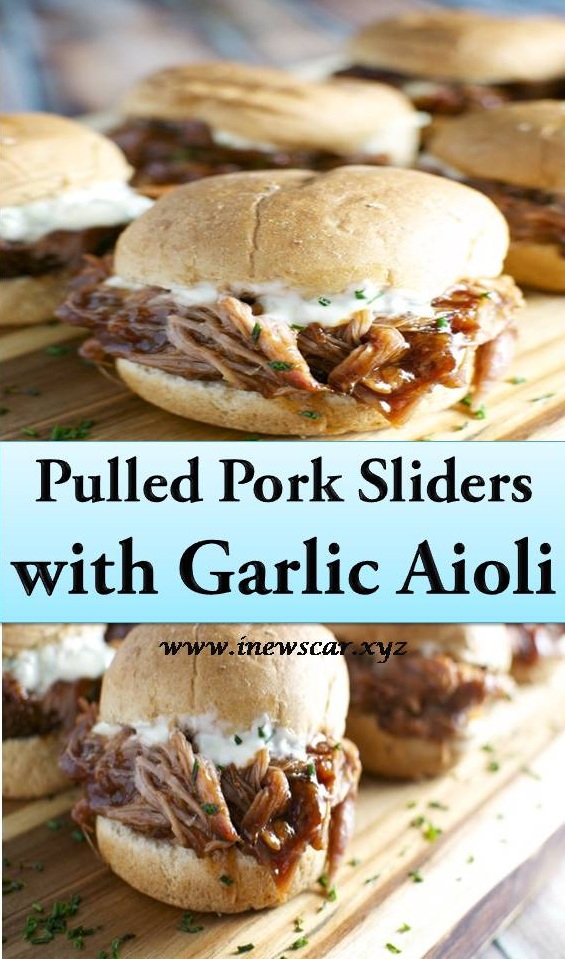 Pulled Pork Sliders with Garlic Aioli are made in the slow cooker, making this recipes a super easy one! Pulled pork is slow cooked in barbecue sauce, shredded then placed on a fluffy bun with garlic aioli…these are definitely a crowd pleaser!