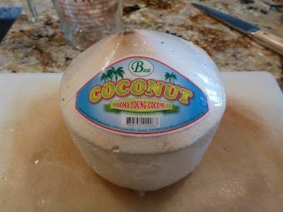 Step 1: Wash the outside of the coconut