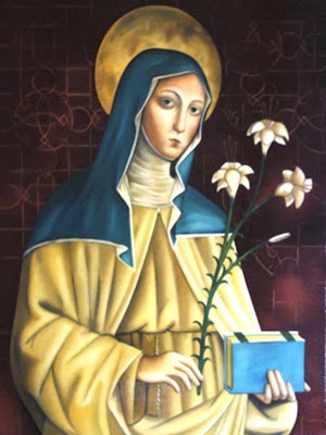 Imagen de Santa Clara con el lirio simbolo de su pureza