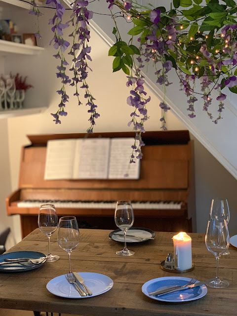 artificial wisteria over dining table