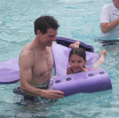 Tom Cruise And His Daughter In Swimingpul Image
