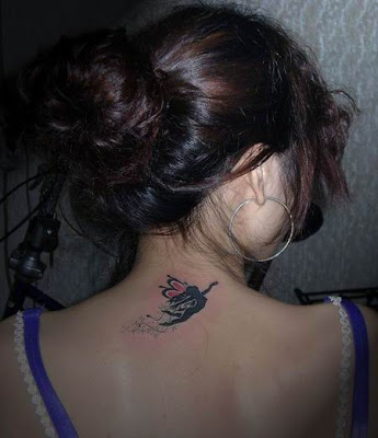 What a nice dark angel tattoo, a torn wing, inked on the shoulder in black!