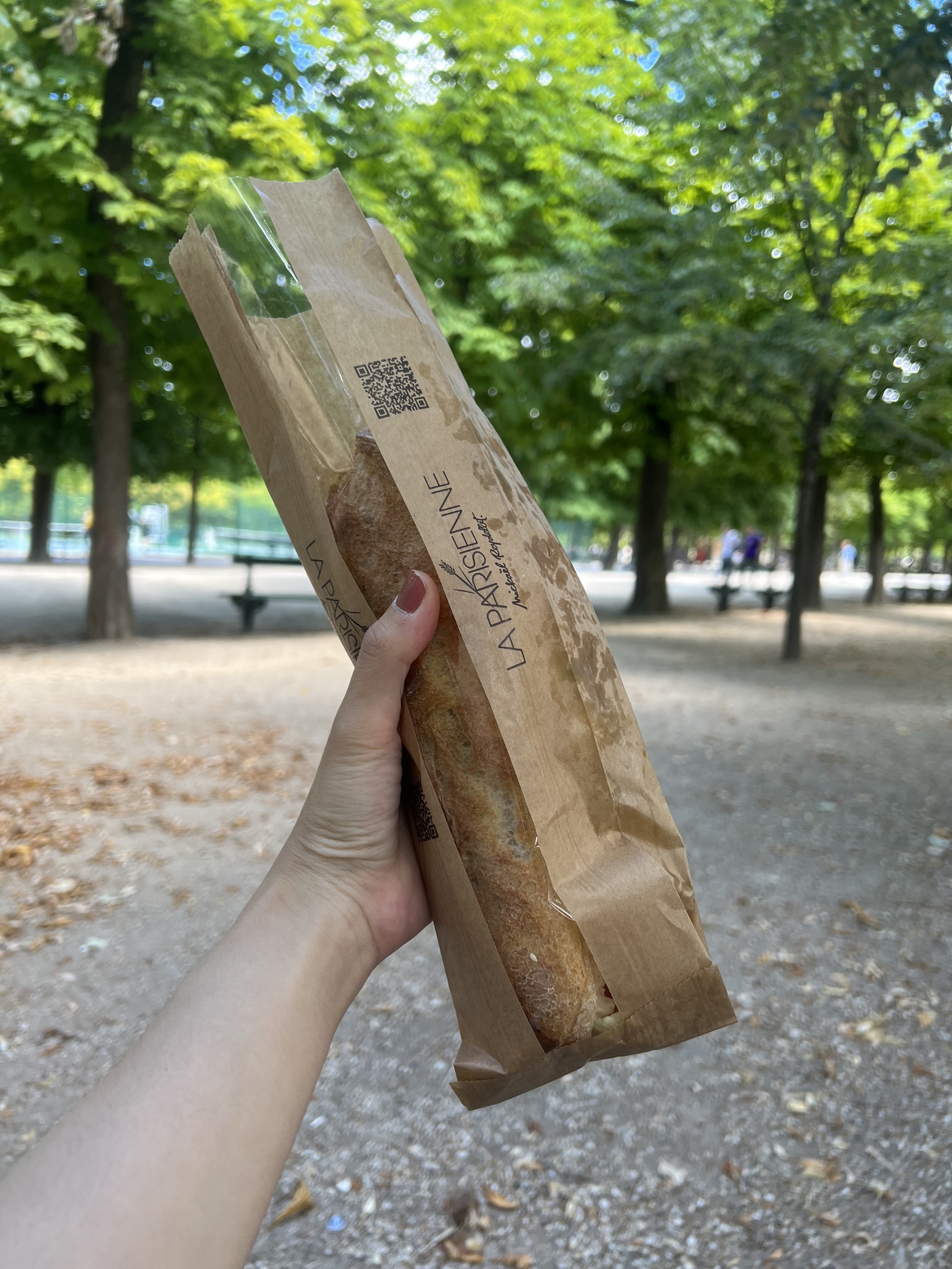 Eating a Sandwich at Jardin du Luxembourg in Paris_Adrienne Nguyen