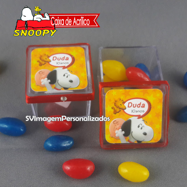   O preço mais barato para Caixinha de acrílico é uma delícia de Lembrancinha, ideal para colocar balinhas, use e abuse para decorar a mesa da festa e a Mesa de guloseimas e no final é um lindo presente para seus convidados no tema Snoopy – O Filme, e sua turma Charlie Brown , festa para meninos e meninas, nas cores vermelho e azul, será um sucesso na decoração de sua festa. 