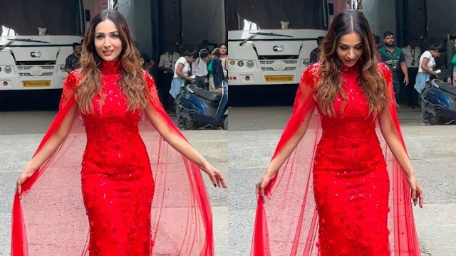 Malaika Arora changes into not-really minimal red riding hood with decorated red caped outfit
