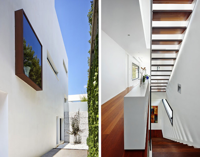 Hallway and Pathway Completed with Tropical Touch on White Railing and Outdoor Wall