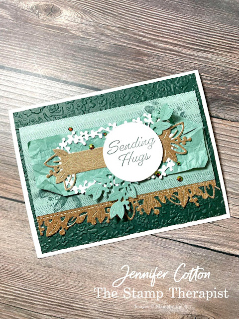 Card with Stampin' Up!'s Eden's Garden Bundle.  Card is landscape.  Evening Evergreen front embossed, Ever Eden DSP 2 1/2 x 5, cotton paper 1 3/4 x 4 3/4, greeting on white 1 3/4 circle. Video on blog post with better descriptions.