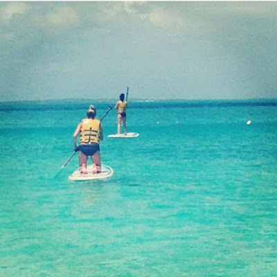 Lucy Hale and best friend Annie Breiter paddle boarding