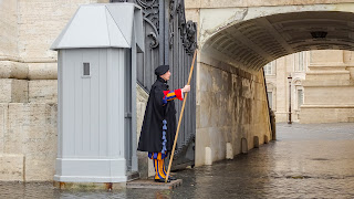 One Swiss guard leaves and another has to take the place