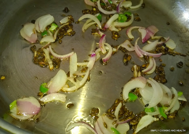 Adding onion and green chili