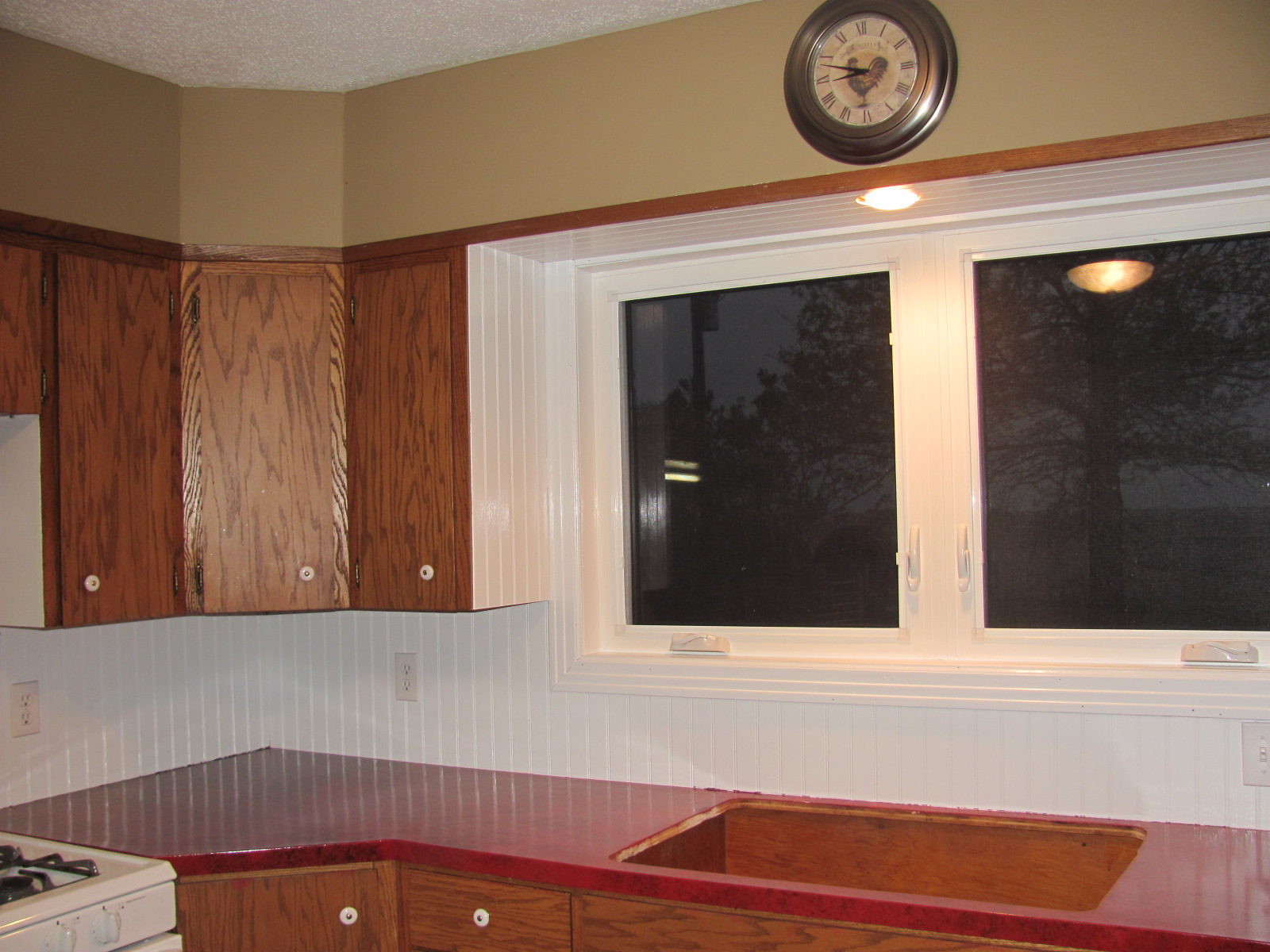 Beadboard kitchen backsplash Rustic White Kitchen with Backsplash